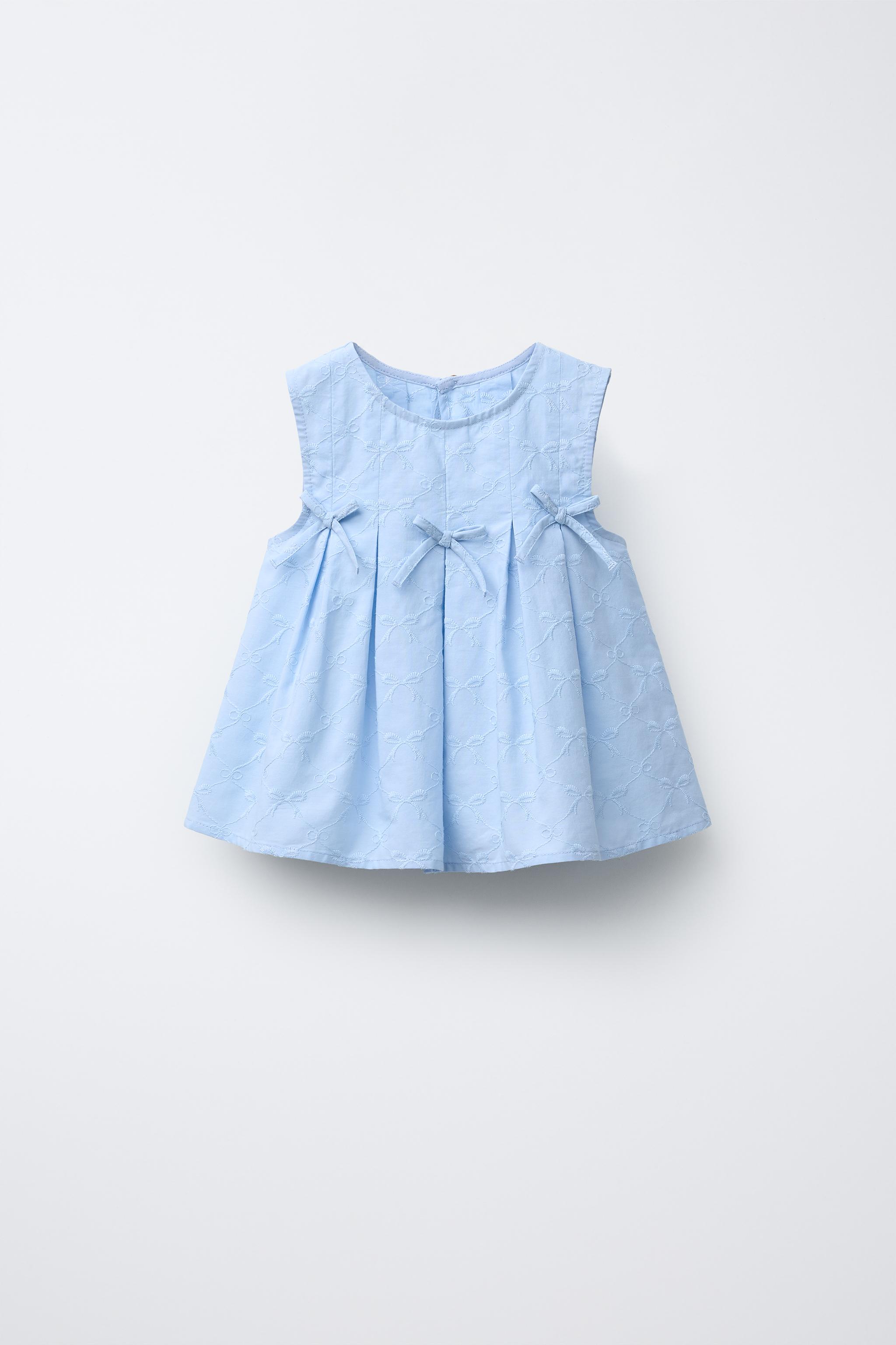 EMBROIDERED BOW TOP
