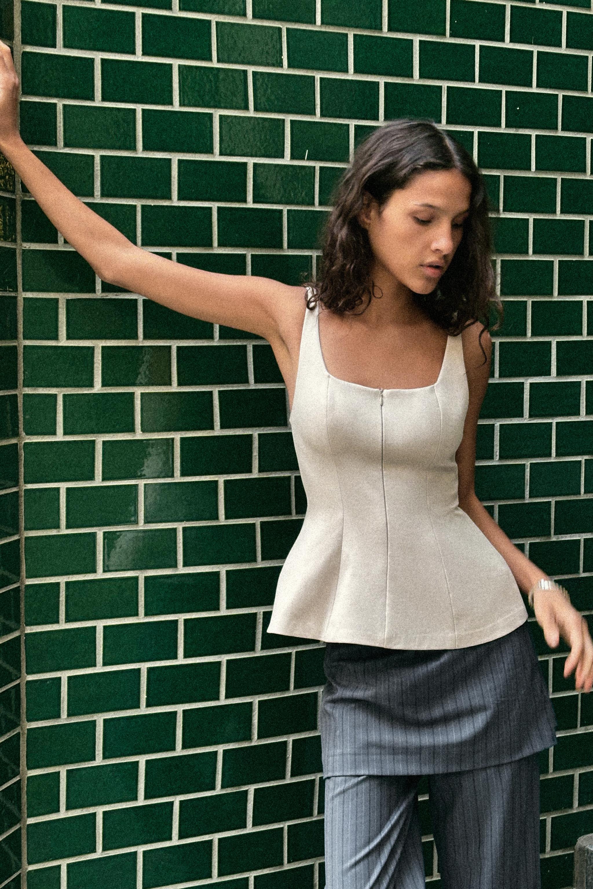 ZIPPER PEPLUM TOP