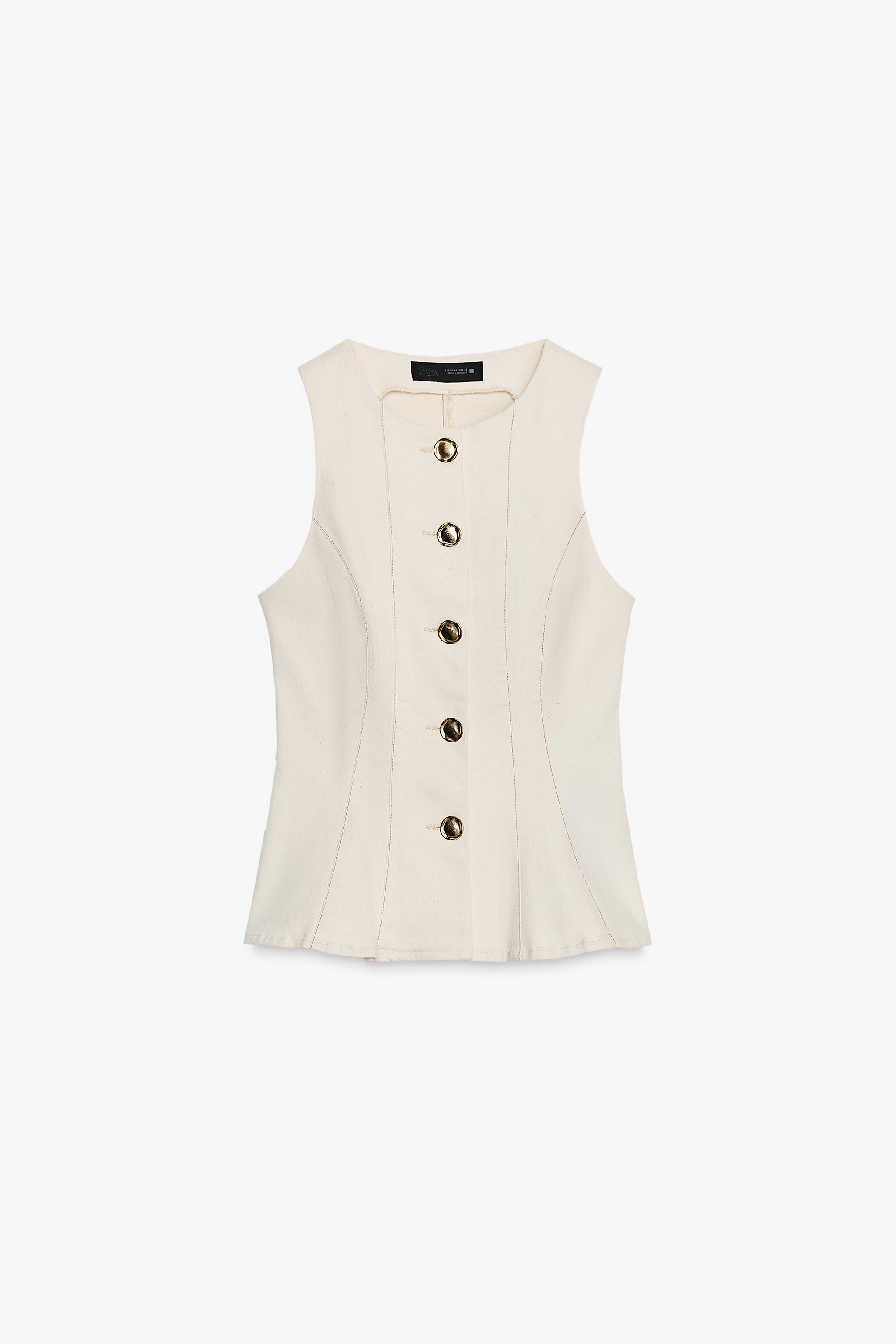 STITCHED PEPLUM VEST