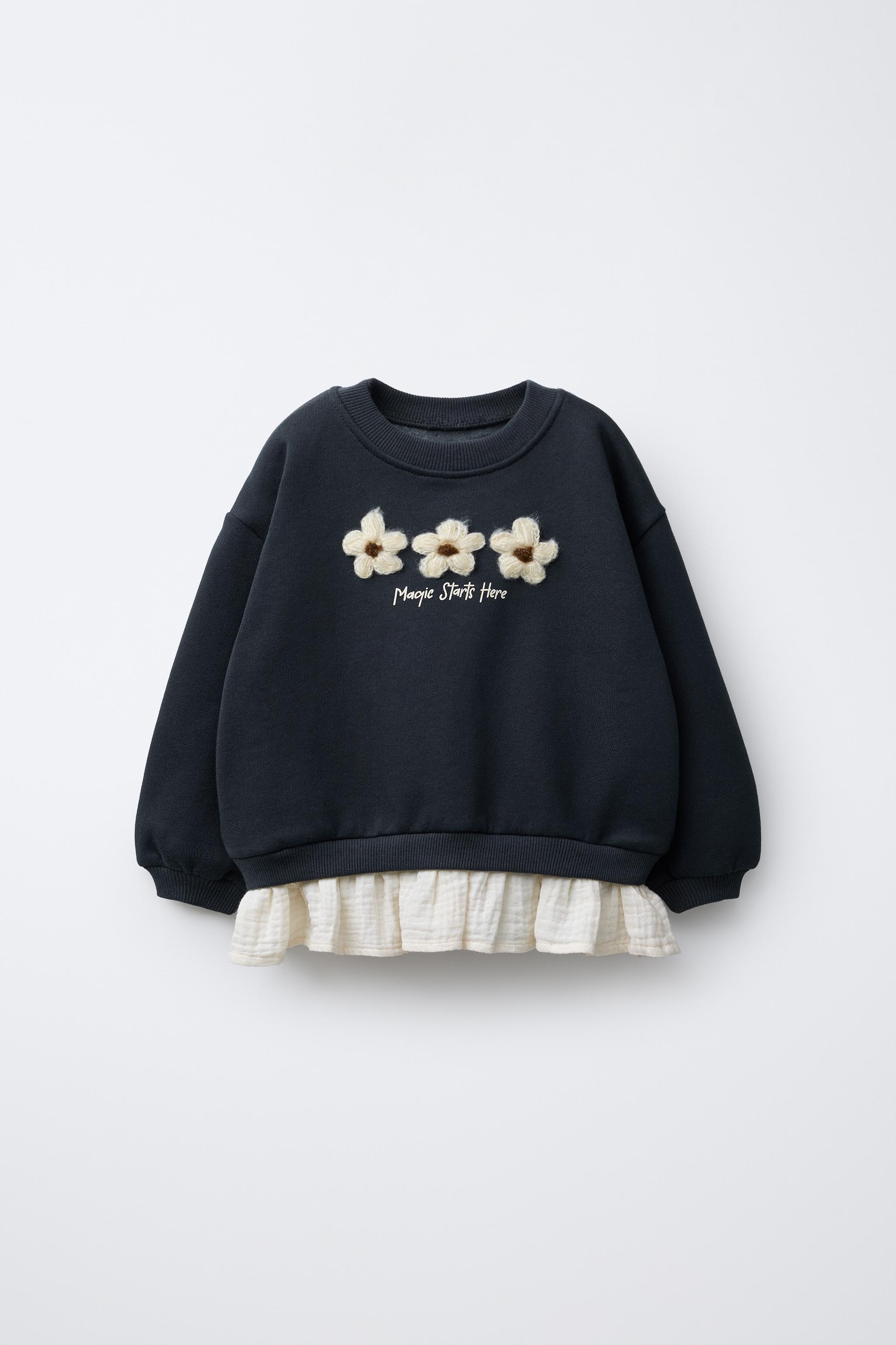 COMBINATION SWEATSHIRT WITH FLORAL APPLIQUÉ