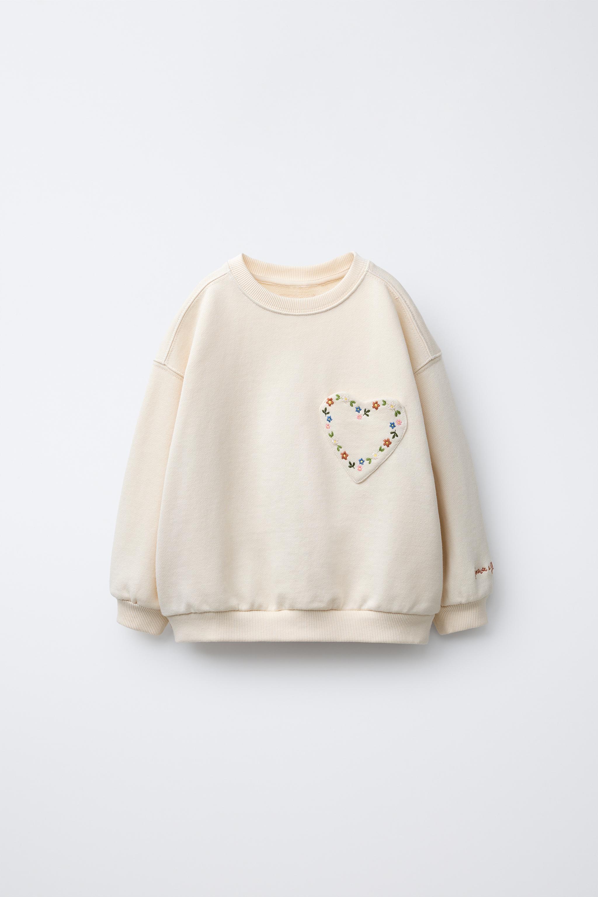 HEART POCKET SWEATSHIRT