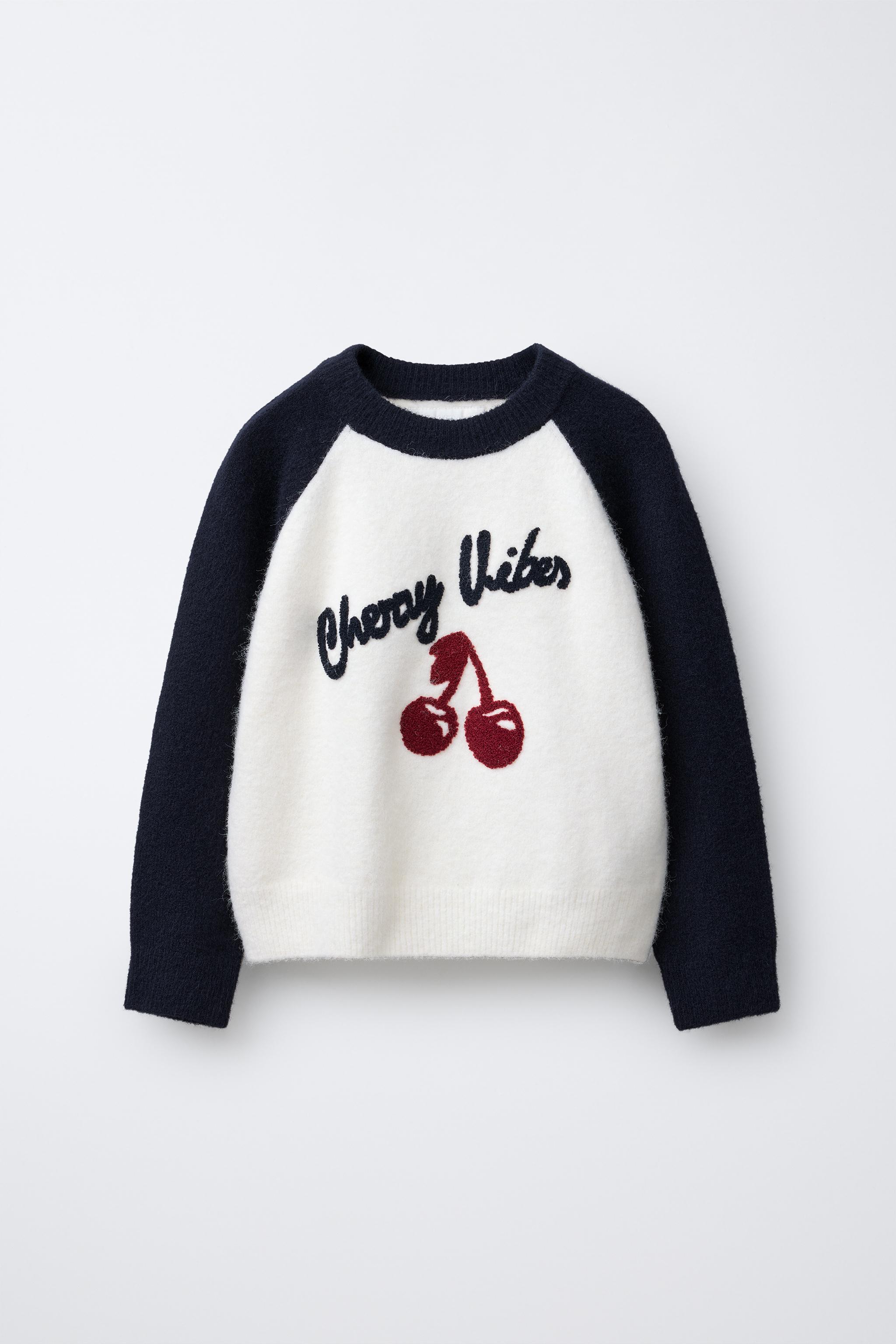 CONTRAST SLEEVE TEXT SWEATER