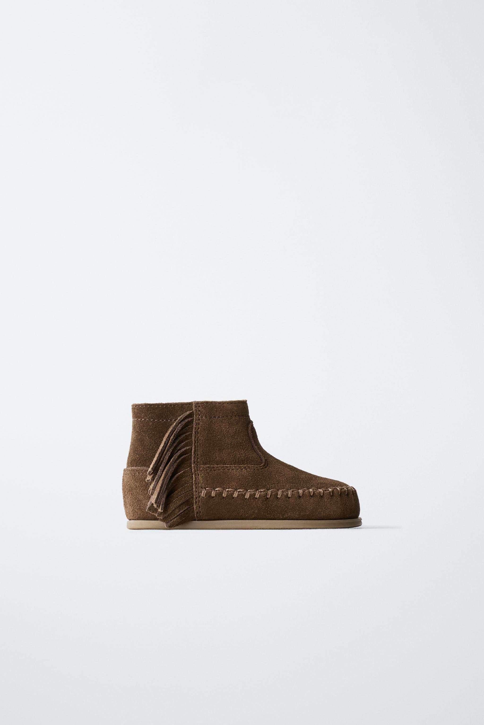 FRINGED LEATHER BOOTS