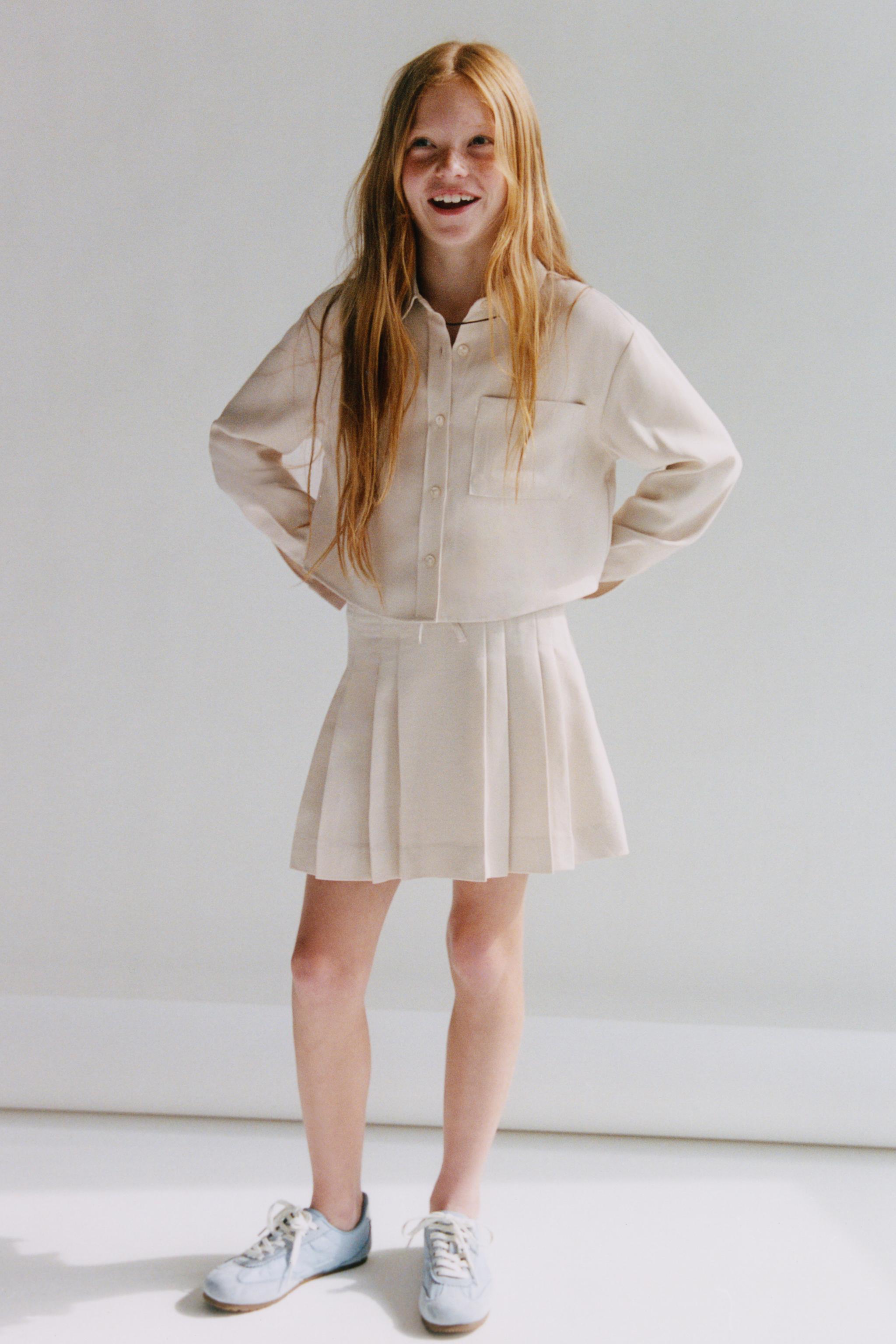 FLOWY PLEATED SKIRT