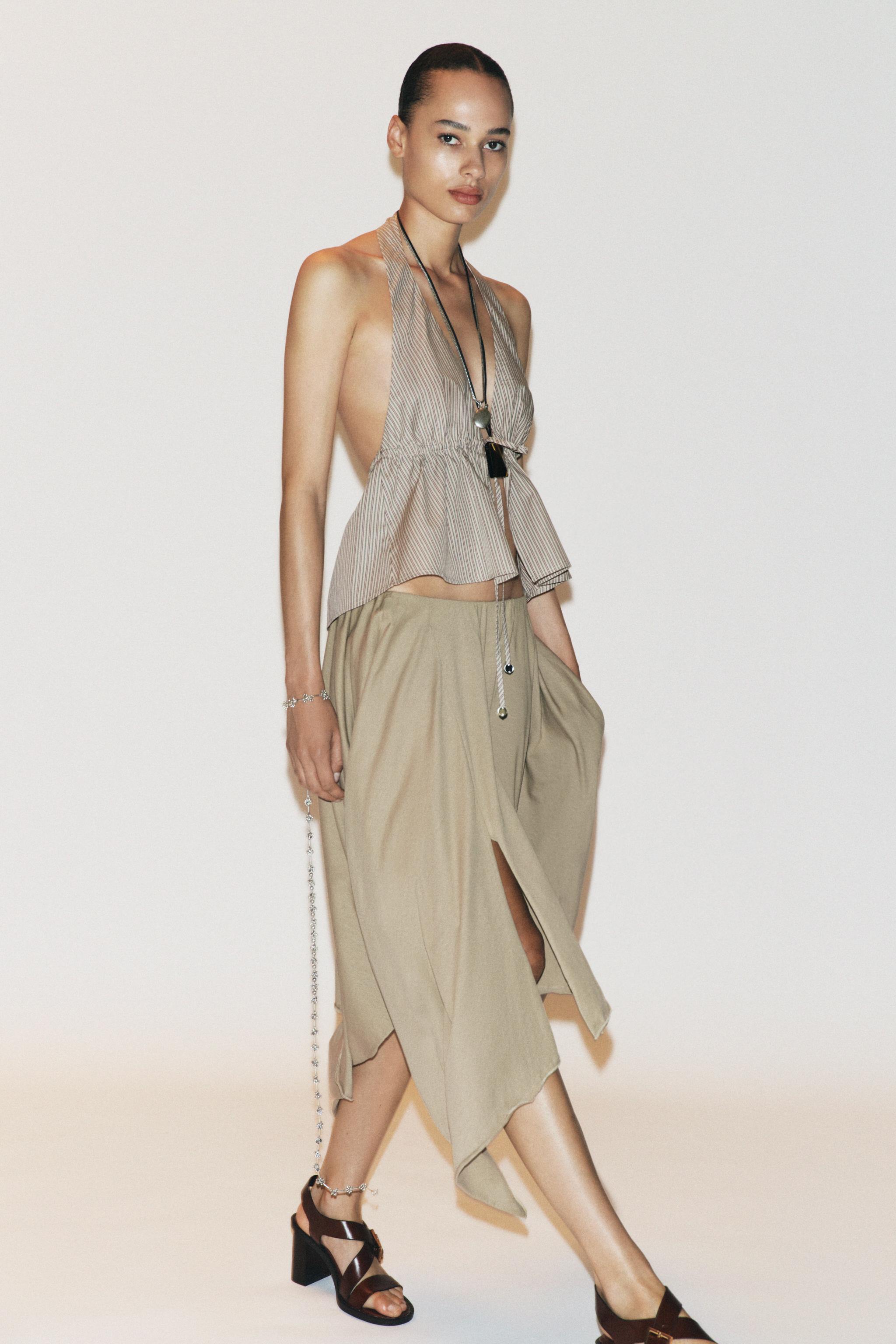 ASYMMETRIC MIDI SKIRT