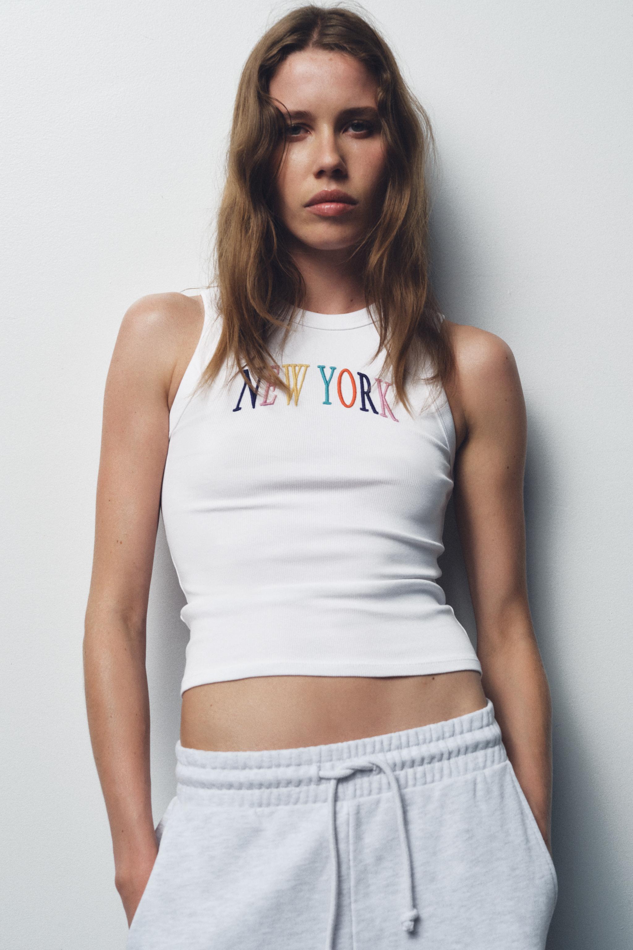 EMBROIDERED TEXT TOP